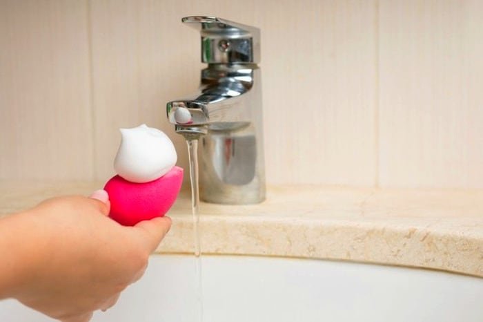 Cleaning makeup sponges.