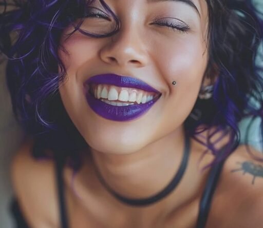A woman with vibrant metallic purple lipstick
